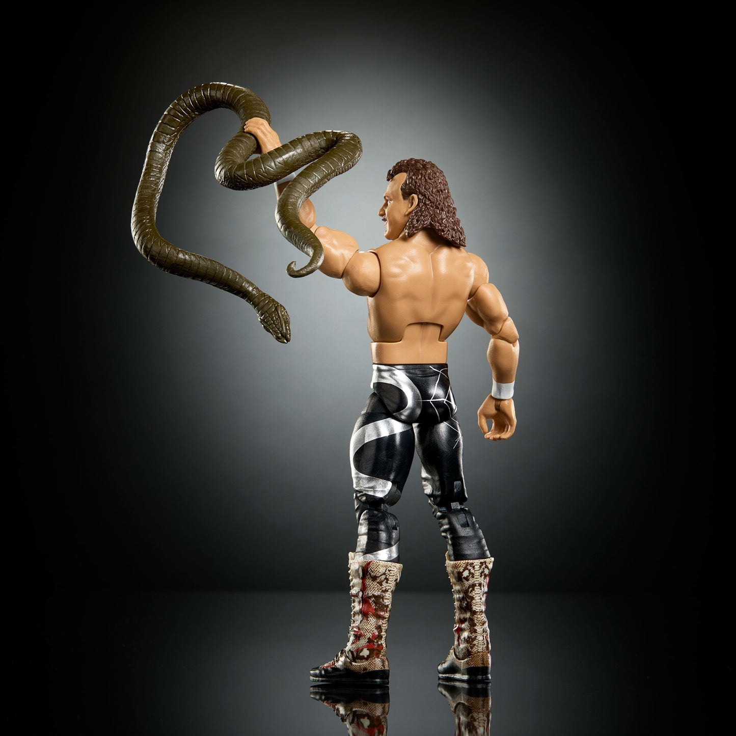 Mattel WWE Elite Collection Action Figure & Accessories, Premium Live Event Jake “The Snake” Roberts Set, Wrestlemania with Sam Roberts Build-A-Figure Parts