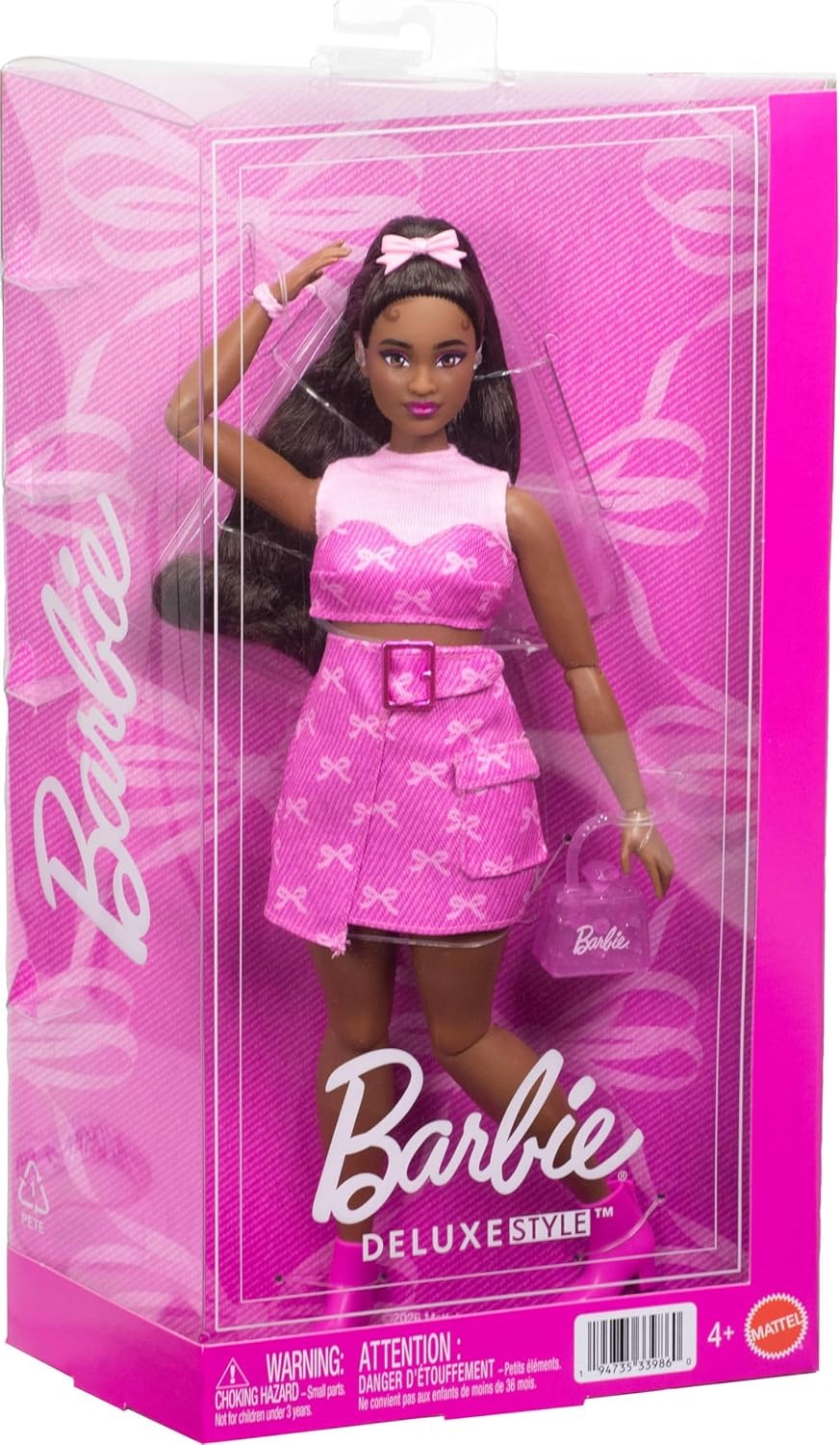 Barbie Deluxe Style Doll #10 in Pink Denim Top and Skirt Set with Bow Print, Black Hair, Behind-The-Ear Hearing Aids and Accessories Like Handbag